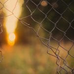 broken-chainlink-fence